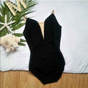 NWOT black bodice leotard with flesh insert